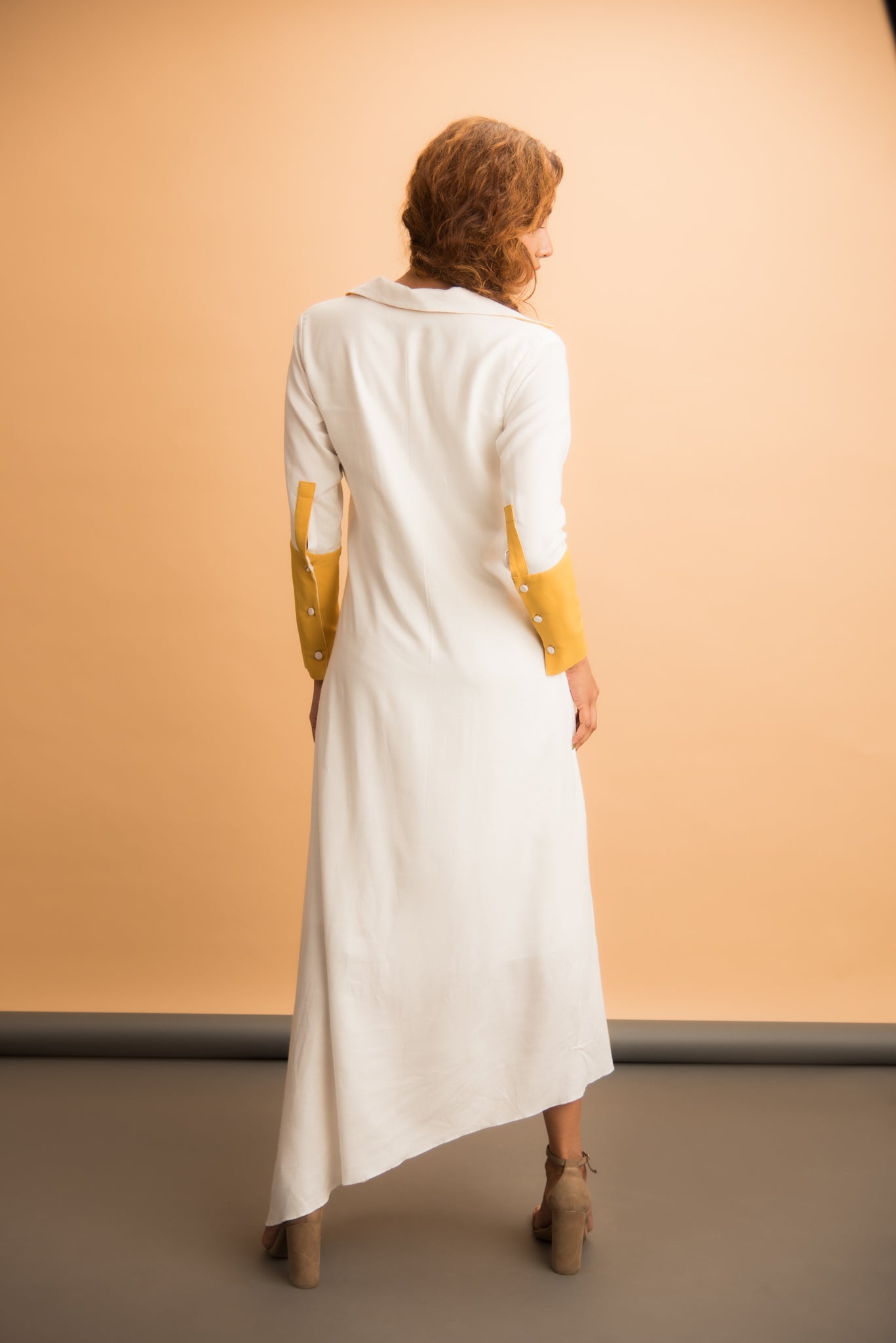 White asymmetrical dress with yellow details